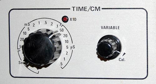 Round control knobs on an oscilloscope