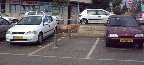 Parking spot with poles