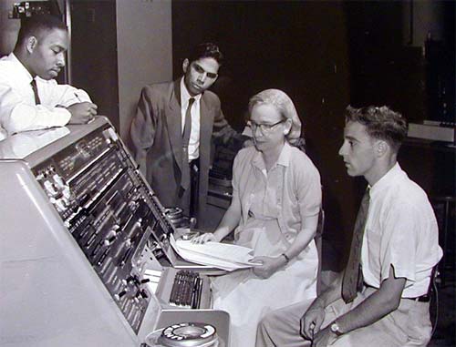 Grace Hopper next to Univac 1 console,1957