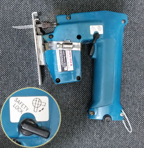 Jigsaw with unmarked safety lock